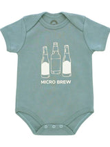 The Emerson and Friends Luxury Bodysuit features a green design with MICRO BREW text & bottle illustrations in premium ringspun cotton.