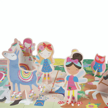 The 60 Piece Rainbow Fairy Floor Puzzle by Floss and Rock inspires imagination with cute cutouts of children, a llama, and an owl.