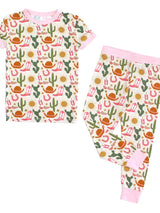 Emerson and Friends PJs, Hey Yall: bamboo baby pajamas with pink trim and a wildlife print of cacti, cowboy hats, boots & suns.