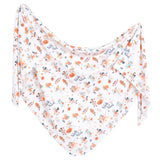 Horizontal display of Copper Pearls Knit Swaddle Blanket, Mickey Mouses Boo Bash with fall-themed prints.
