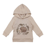 The Lovedbaby Organic Hoodie Prickles is beige with a hedgehog and leaves print, crafted from eco-friendly organic cotton.