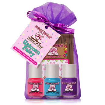 The Piggy Paint Unicorn Fairy gift set includes three colorful, non-toxic, water-based nail polishes and unicorn nail art in a purple sheer bag.