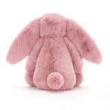 A Jellycat Bashful Tulip Bunny Medium toy, soft with nuzzly ears and a fluffy tail, meets the European Safety Standard.