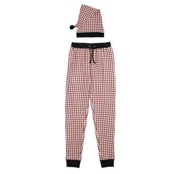 The Lovedbaby Adult Holiday Jogger & Cap in Crimson Plaid features black cuffs and waistband, paired with a Santa hat with black pom-pom.