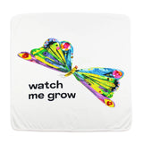 The Lovedbaby Organic Blanket, Watch Me Grow features a colorful butterfly design, crafted with eco-friendly dyes and inspired by Eric Carle.