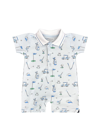 The Noomie Golf Romper features clubs, carts, and flags on a pale base with blue and green accents in Pima cotton.