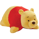 Winnie the Pooh Pillow Pet: a yellow bear with a red shirt lying on its belly, by Pillow Pets.