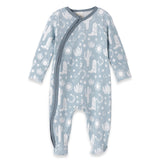 The Tesa Babe Wild West Blue Romper is a wrap-style onesie with white desert-themed cowboy prints.