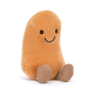 Jellycat Amuseables Bean plush toy, light brown with a smiley face and two beige feet, sits upright.