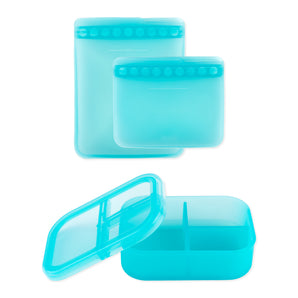 The Bumkins Silicone Bento Box 3 Section & Flat Reusable Bag Set in Blue Jelly includes a lunch box and two blue storage bags.