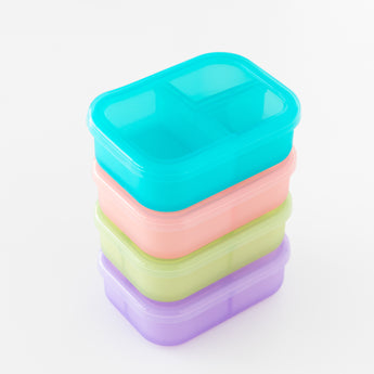 Bumkins Silicone Bento Box 3 Section: Blue Jelly sits stacked on top of three other boxes on a white background.