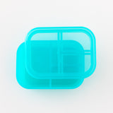 Top down view of Bumkins Silicone Bento Box 3 Section: Blue Jelly on a white background.
