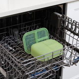 Bumkins Silicone Bento Box 3 Section: Green Jelly sits in the top rack of an open dishwasher.