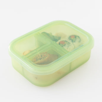 Bumkins Silicone Bento Box 3 Section: Green Jelly neatly holds sushi rolls and snacks on a white background.