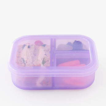 Bumkins Silicone Bento Box 3 Section: Purple Jelly, with a leak-resistant lid, holds food in its compartments on a white background.
