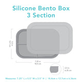 Gray silhouette of Bumkins Silicone Bento Box with dimensions—width: 7.25 in (18.4 cm), height: 5.5 in (12.7 cm), depth: 2.5 in (6.35 cm).