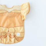 Bumkins Ruffle Apron Bib: Belle is shown on a white background, partially out of frame.