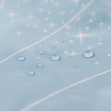 Close-up of water droplets on Bumkins Ruffle Apron Bib: Cinderella.