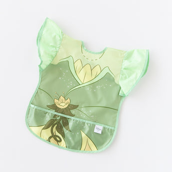 Bumkins Ruffle Apron Bib: Tiana lays flat on a white background.