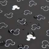 Close-up of water droplets on a Bumkins The Chaos Coordinator Essential 4-Piece Set: Mickey Mouse Icon Black + White.
