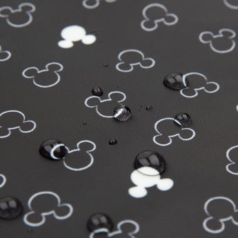 Close-up of water droplets on a Bumkins The Chaos Coordinator Essential 4-Piece Set: Mickey Mouse Icon Black + White.