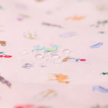 Close-up of water droplets on a Bumkins Snack In Character 4-Piece Set: Disney Princess Magic Belle.