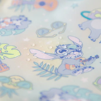 Close-up of water droplets on a Bumkins Snack Bag 4 Pack: Stitch Star-ring Up Trouble.