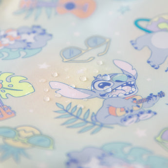 Close-up of water droplets on a Bumkins Junior Bib 2 Pack: Stitch Star-ring Up Trouble.