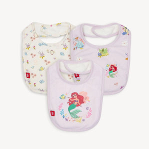 Magnetic Me 3-Pack Bib Disney Princess: Three colorful bibs with flower, bird, and mermaid designs on pastel backgrounds.