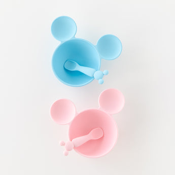Bumkins Silicone First Feeding Set: Mickey Mouse Light Blue is shown sitting above a similar bowl on a white background.