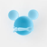Bumkins Silicone First Feeding Set: Mickey Mouse Light Blue features a mouse-ear shaped bowl & matching silicone spoon on a white background.