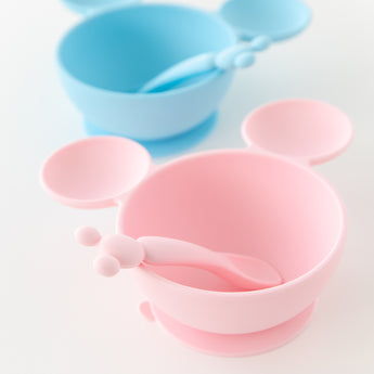 Bumkins Silicone First Feeding Set: Minnie Mouse Light Pink sits in front of a similar bowl on a white background.