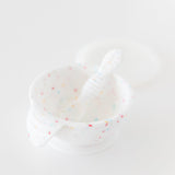 Bumkins Silicone First Feeding Set: Vanilla Sprinkle is displayed on a white background.