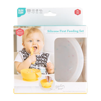 Bumkins Silicone First Feeding Set: Vanilla Sprinkle is shown in a white packaging box, with a clear window partially showing the bowl.