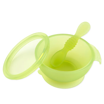 Bumkins Silicone First Feeding Set: Green Jelly, made from LFGB-grade silicone, includes a lid and spoon, ideal for self-feeding babies.