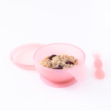 Bumkins Silicone First Feeding Set: Pink Jelly holds berries and oatmeal on a white background.