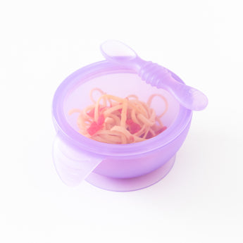 Bumkins Silicone First Feeding Set: Purple Jelly holds spaghetti and tomatoes on a white background.