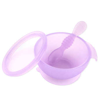 Bumkins Silicone First Feeding Set: Purple Jelly, made from LFGB-grade silicone, includes a bowl with a suction base, spoon, and lid.