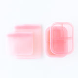 Bumkins Silicone Lunchtime 4-Piece Set: Pink Jelly is neatly arranged on a white background.