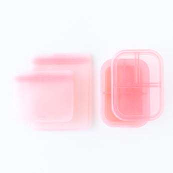 Bumkins Silicone Lunchtime 4-Piece Set: Pink Jelly is neatly arranged on a white background.