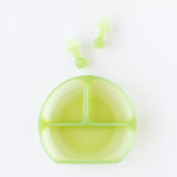 Bumkins Silicone Chewtensils®: Green Jelly rest above a matching divided plate on a white background.