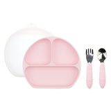 Bumkins Grip Dish Essential Toddler 4-Piece Mealtime Set: Pink includes a pink silicone dish, pink utensils, & a transparent lid.
