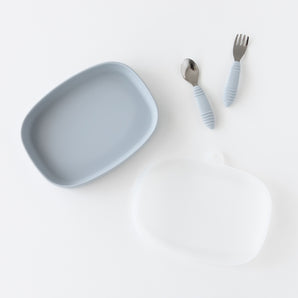 Bumkins Grip Tray Essential 4-Piece Mealtime Set: Gray is arranged neatly on a white background.