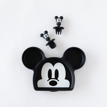 The Growing with Bumkins Gift Set, Disney Mickey Mouse adds charm to your silicone feeding set with a plate, fork, and bottle stopper.