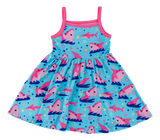 The Gwen Birdie Dress by Birdie Bean is comfy and lightweight, featuring blue with pink straps and rocket ships on a starry background.