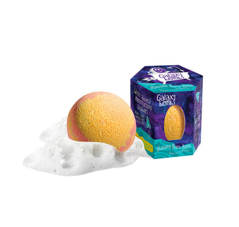 A colorful Galaxy Bath Bomb by Loot Toys sits next to its space-themed hexagonal box, surrounded by white bubbles.