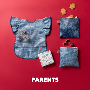 Blue bib, two blue pouches, gift box, and gingerbread cookies on a red background with the word PARENTS at the bottom.