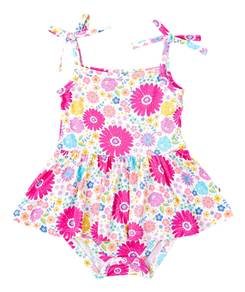 Jasmin Birdie Twirl by Birdie Bean: A bamboo viscose floral baby romper with pink/yellow flowers, spaghetti straps, and skirted bottom.
