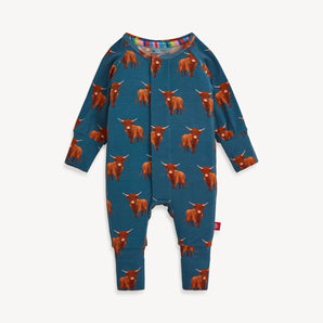 Magnetic Me Coverall Word to your Herd: blue long-sleeve onesie with brown highland cow print, made from eco-friendly TENCEL modal.