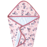 Pink baby hooded towel in terry cloth with cartoon prints, hearts, and pink trim. Lined in soft fabric. Copper Pearl’s Minnie Mouse towel.
